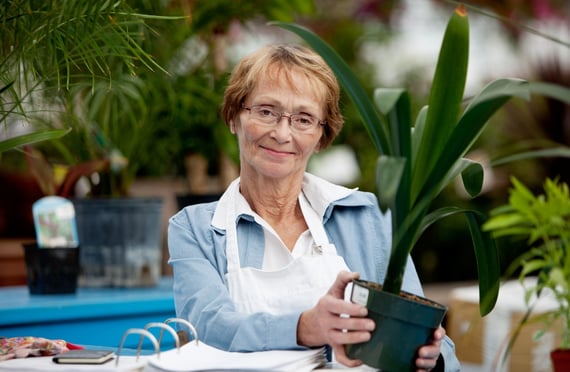 woman tending to her plants in retirement